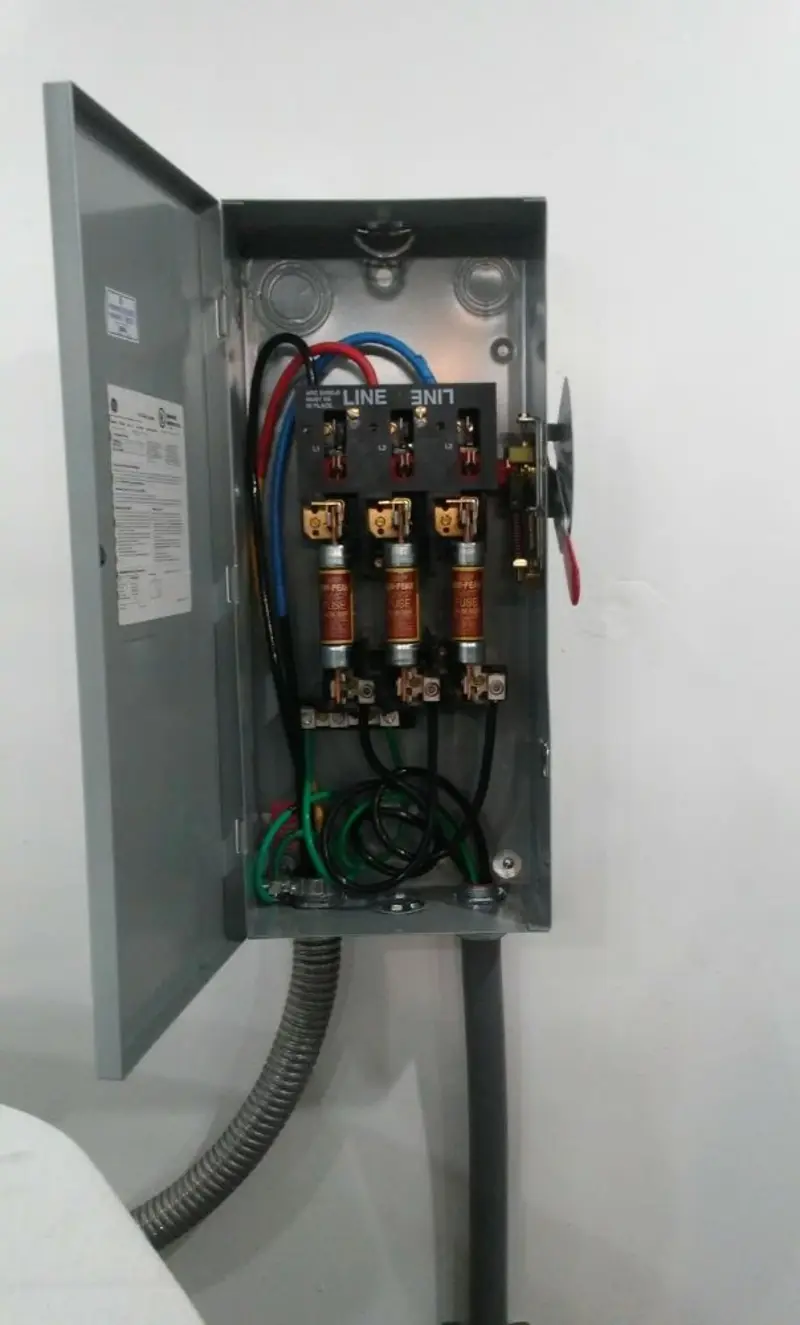 Three-phase disconnect switch installed for Smoke Detector Installation in Colden